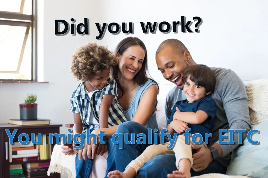 Smiling family on a sofa: Did you work? You might qualify for EITC